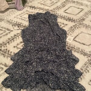 Leopard print mini dress, with elastic synching.